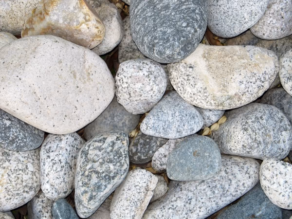 Crushed base rock and clean drain rock compared for a Roseville construction project