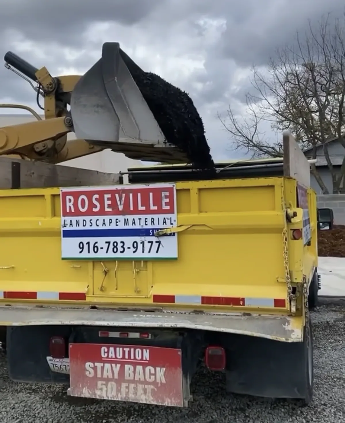 Landscape material delivery truck