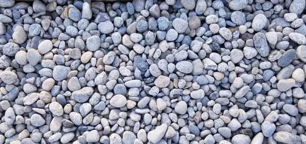 Salt and pepper rock used in a landscaped garden